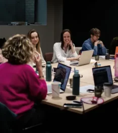 AG Impact team in meeting