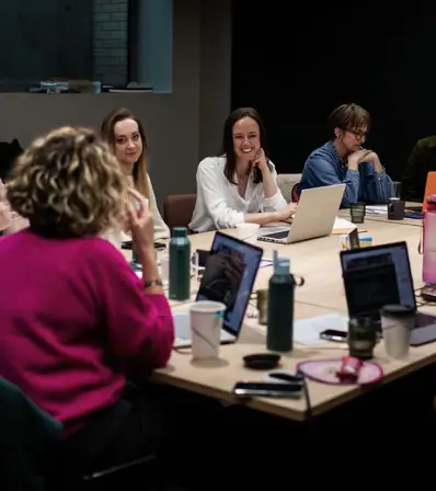 AG Impact team in meeting