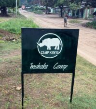 The camp welcome sign
