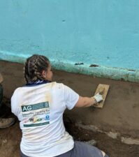 Ciara helps with building work